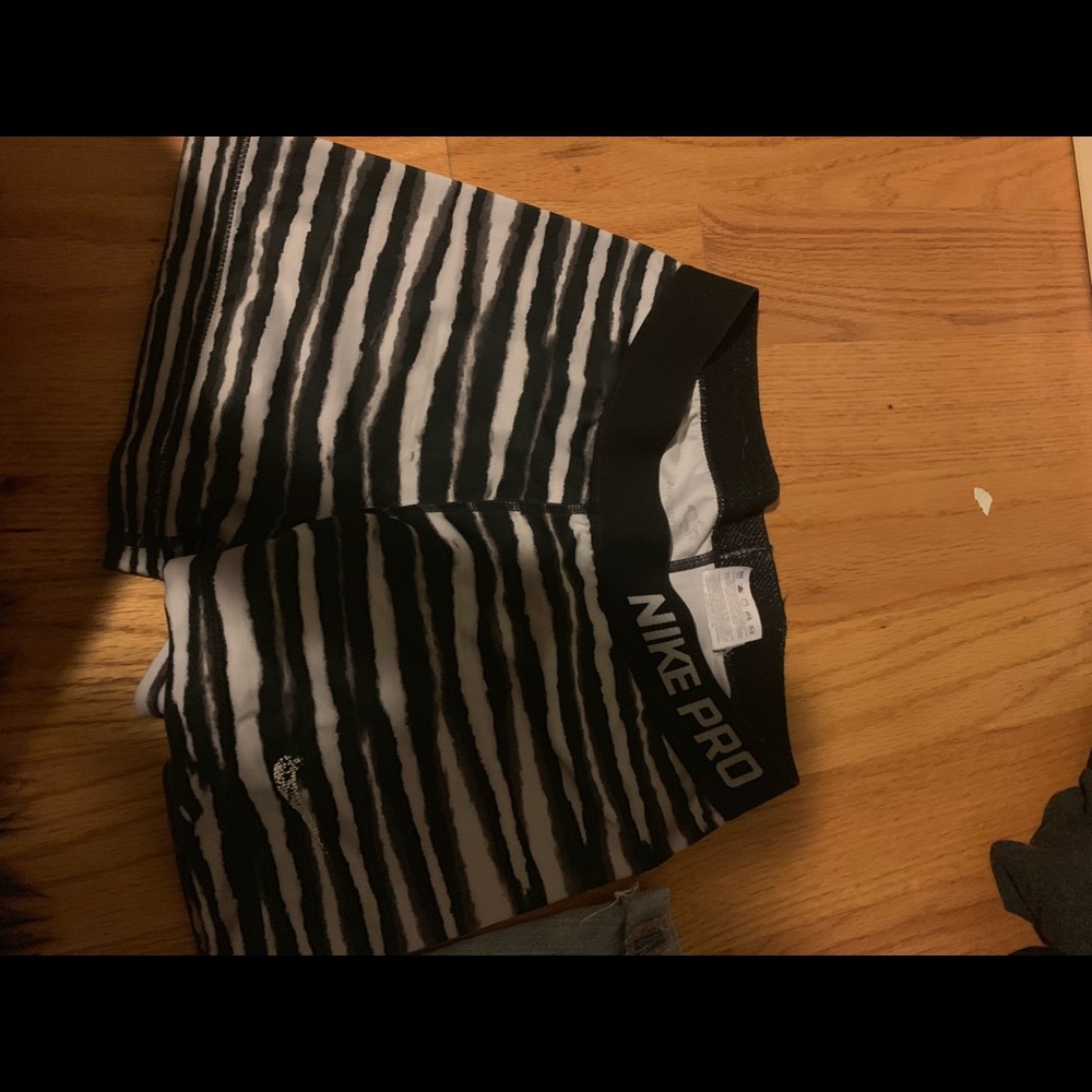 2 pairs of nike spandex. $8 each or 14 for both